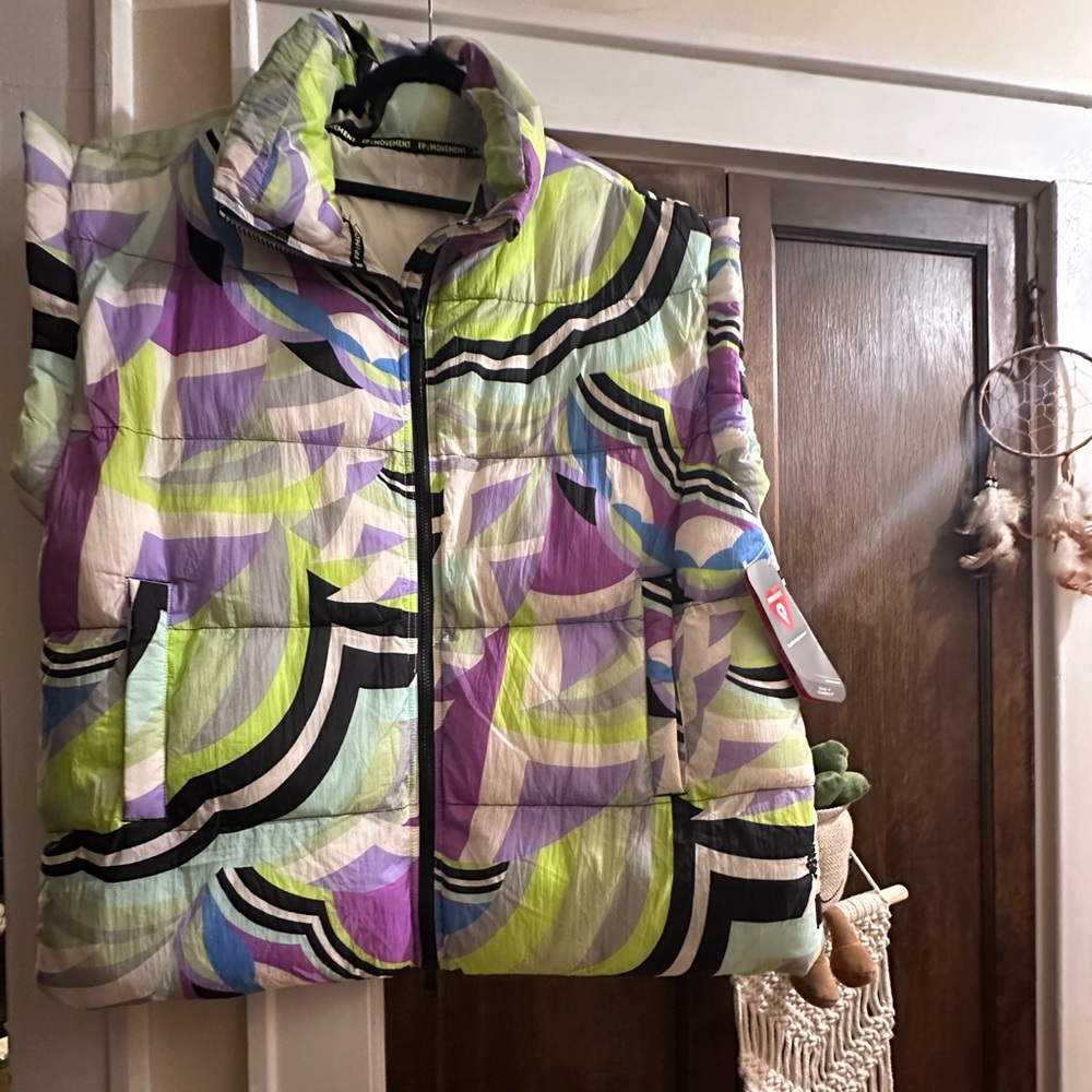 NWT Free People movement Size L- multi color puffer vest